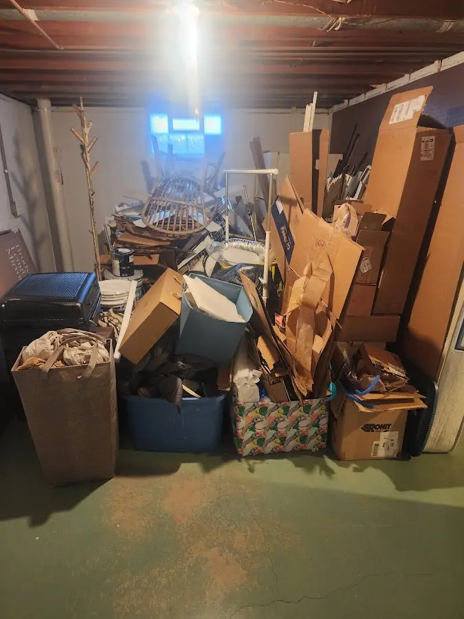 Roll-off dumpster container at job site for Yard Waste Dumpster Rental in West Burlington